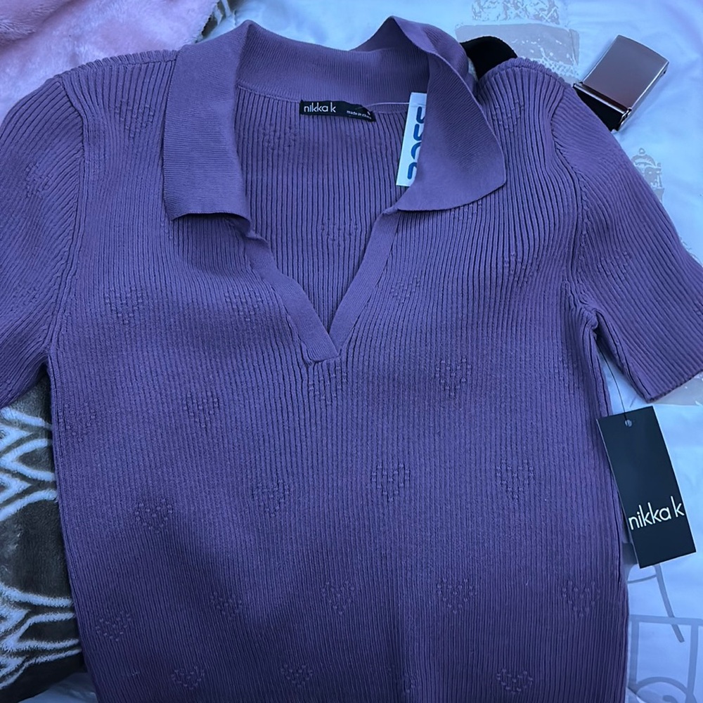 It is a size small the color is a dusty lilac